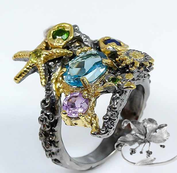 Серебряное кольцо с голубым топазом арт 3993