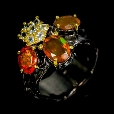 Серебряное кольцо с огненным опалом и топазом натуральным арт 28222