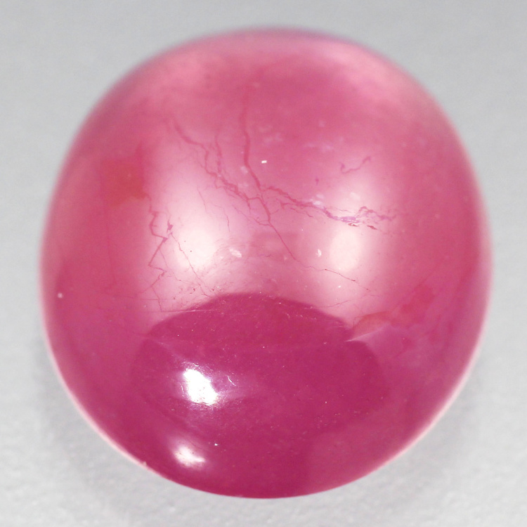 Камень Корунд розовый. Рубин кабошон. Розовый прозрачный камень. Розовый камень в ювелирных.