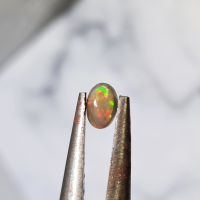 Камень черный австралийский опал 0.4 карат натуральный 6х4 мм арт 50338
